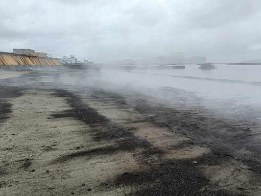 Water vapor emanating from sand